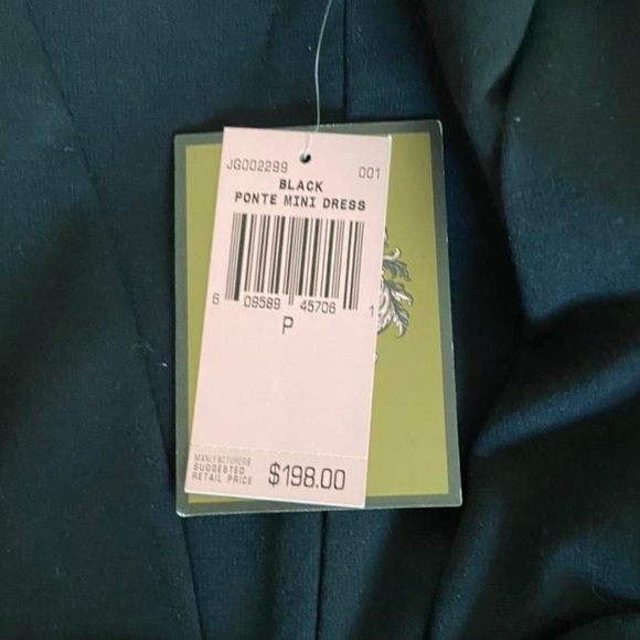 Juicy Couture black mini dress with bow in the back. - Picture 4 of 4